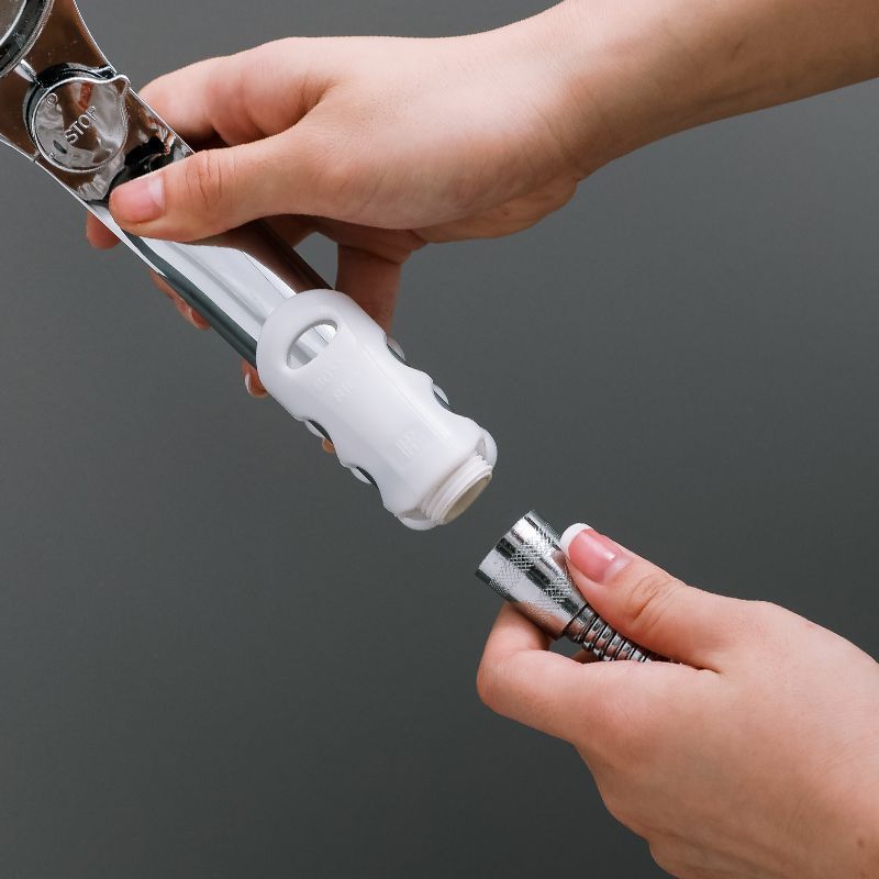 Shower head suction holder for the bathroom