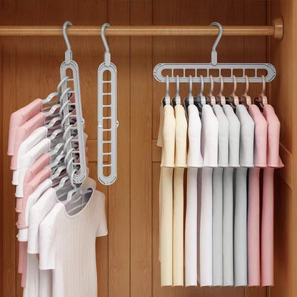 Rotating hanger for hanging multiple clothes