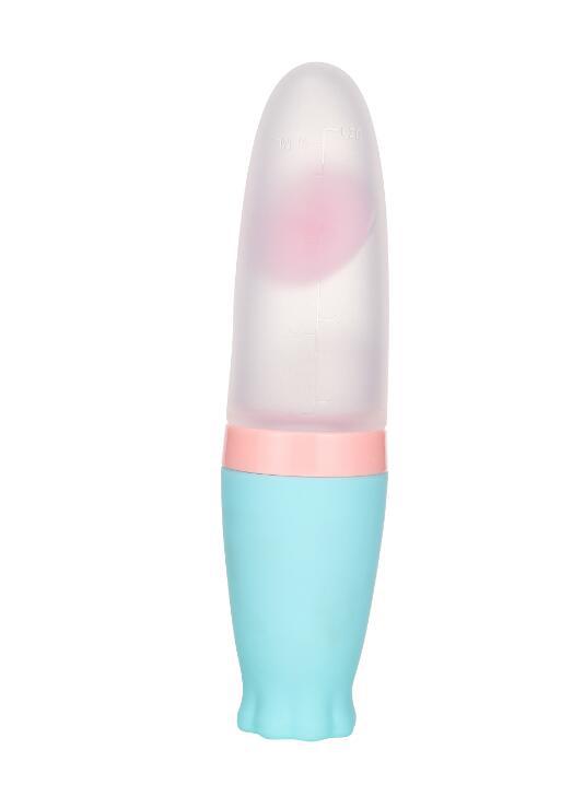 Baby feeding spoon, pink bottle with blue cover