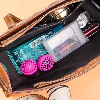 Reusable sticky ball that cleans the inside of handbags
