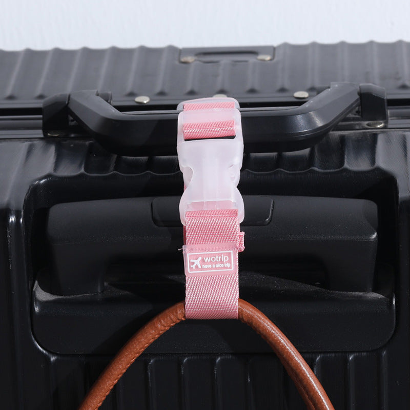 Luggage strap for carrying a handbag on wheeled luggage