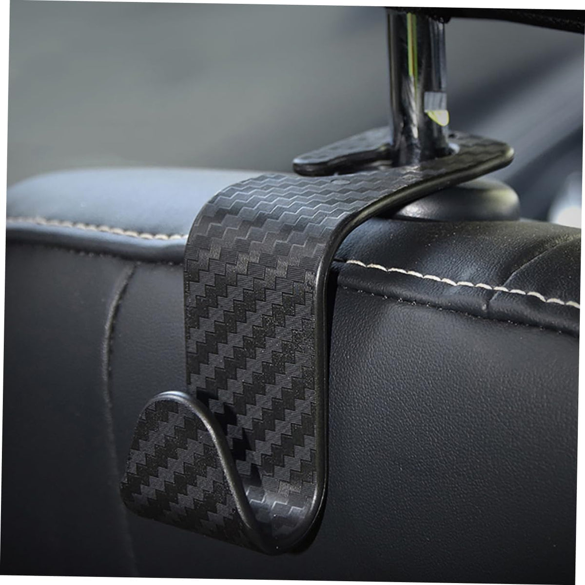 Headrest hanger for bags and coats