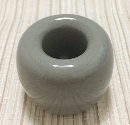Ceramic toothbrush holder in grey