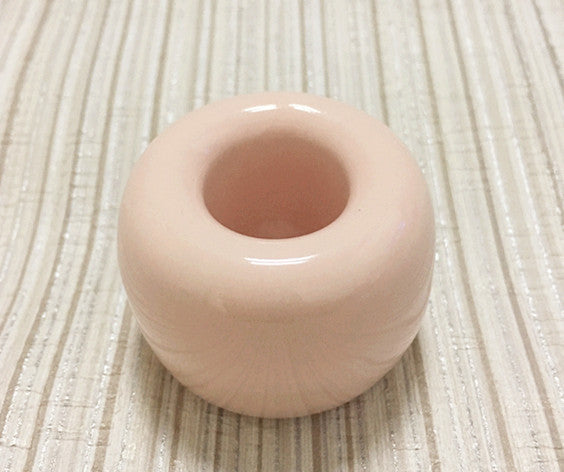 Ceramic toothbrush holder in pink