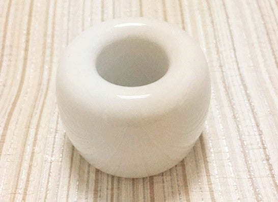 Ceramic toothbrush holder in white