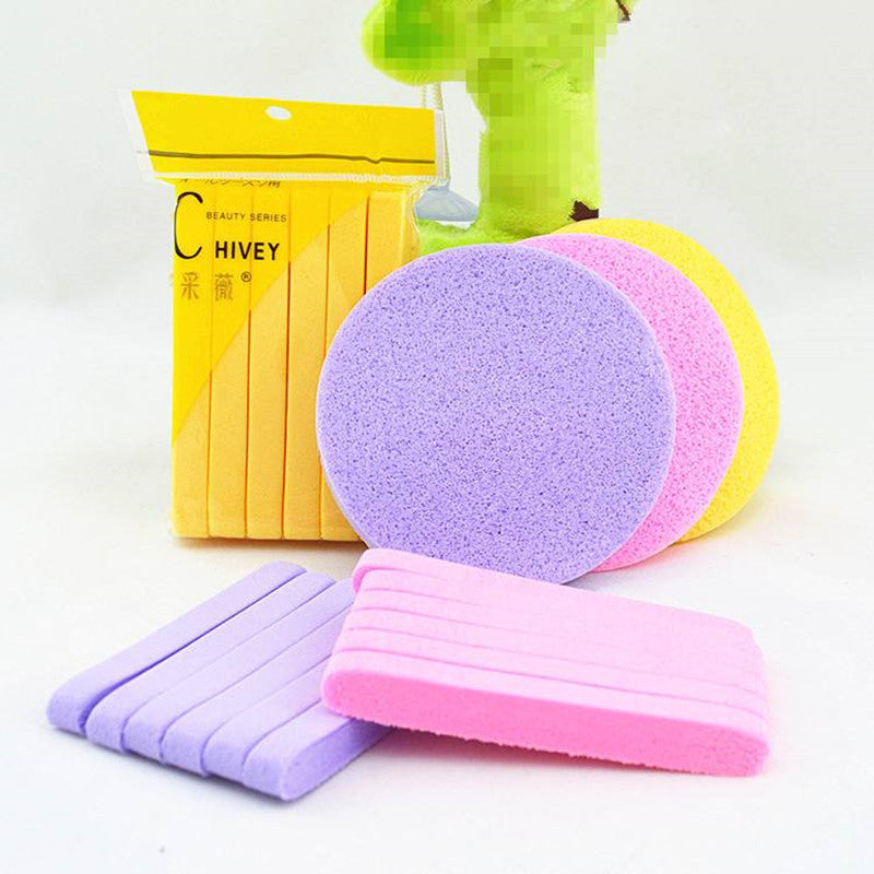 Compressed facial sponges in pink and yellow