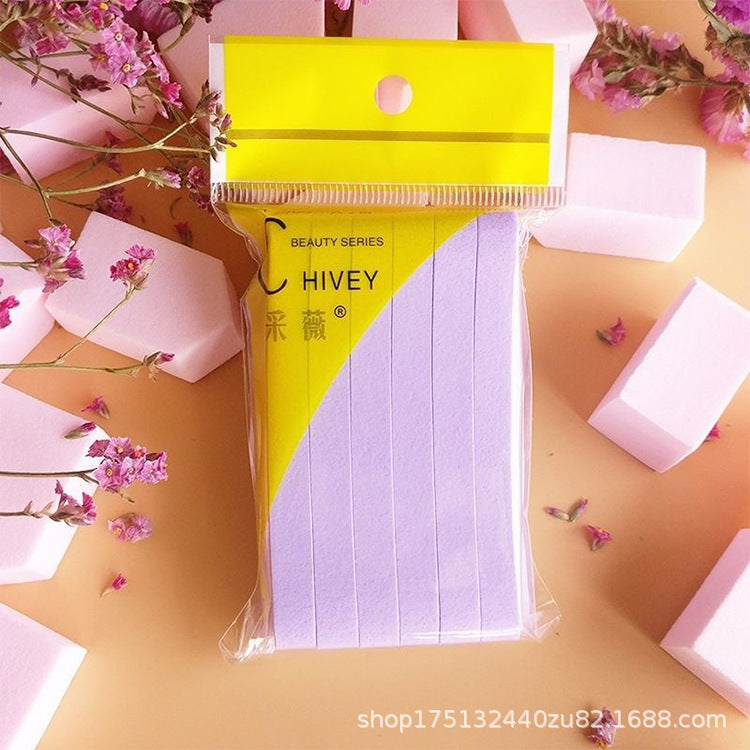 Compressed facial sponges in purple