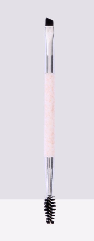 Dual ended eyebrow brush in light beige