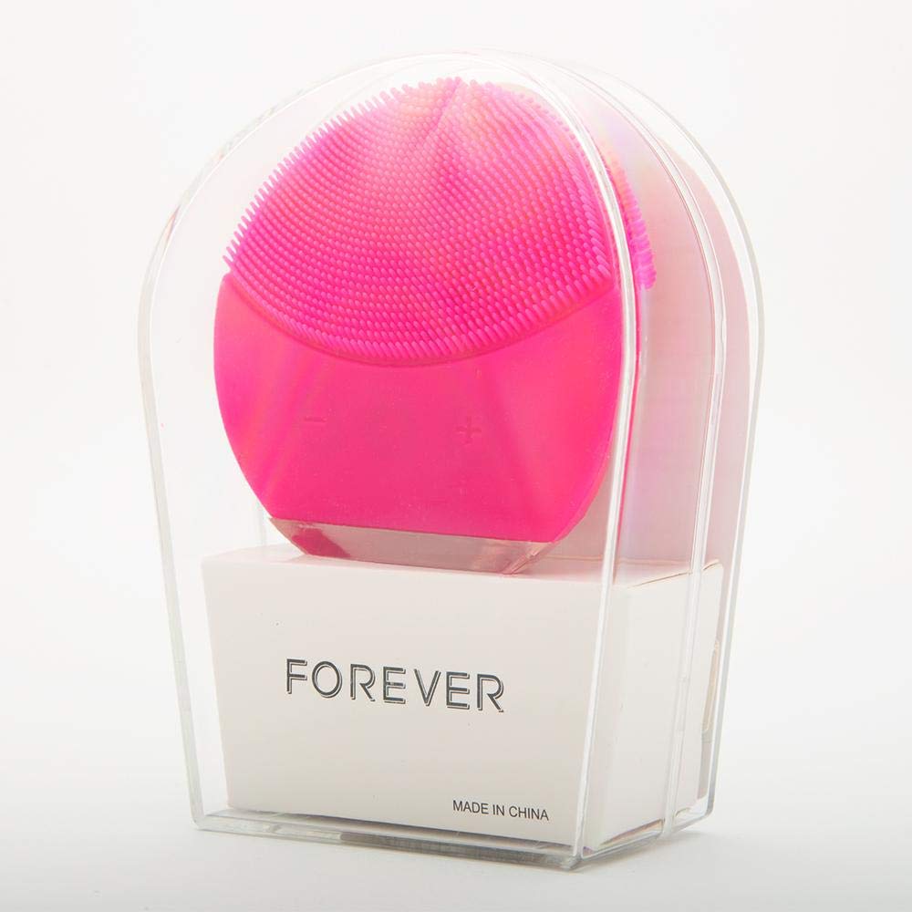 Electric facial cleanser in fuchsia