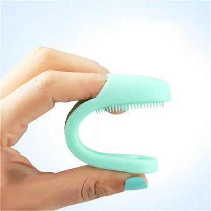 Face cleansing finger brushes in assorted colors