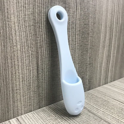 Face cleansing finger brush in light blue