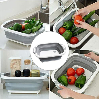 Cutting board with built-in collapsible sink