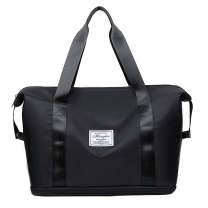 Foldable large capacity duffel bag in black, water-resistant vegan leather