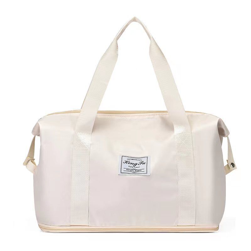 Foldable large capacity duffel bag in ivory, water-resistant vegan leather