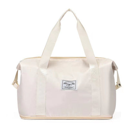 Foldable large capacity duffel bag in ivory, water-resistant vegan leather
