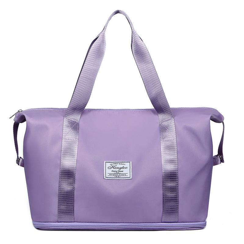 Foldable large capacity duffel bag in purple, water-resistant vegan leather