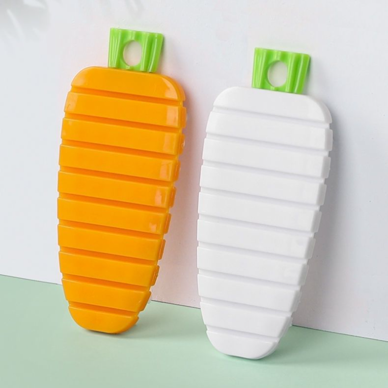 Fruit and vegetable cleaning brush in orange and white