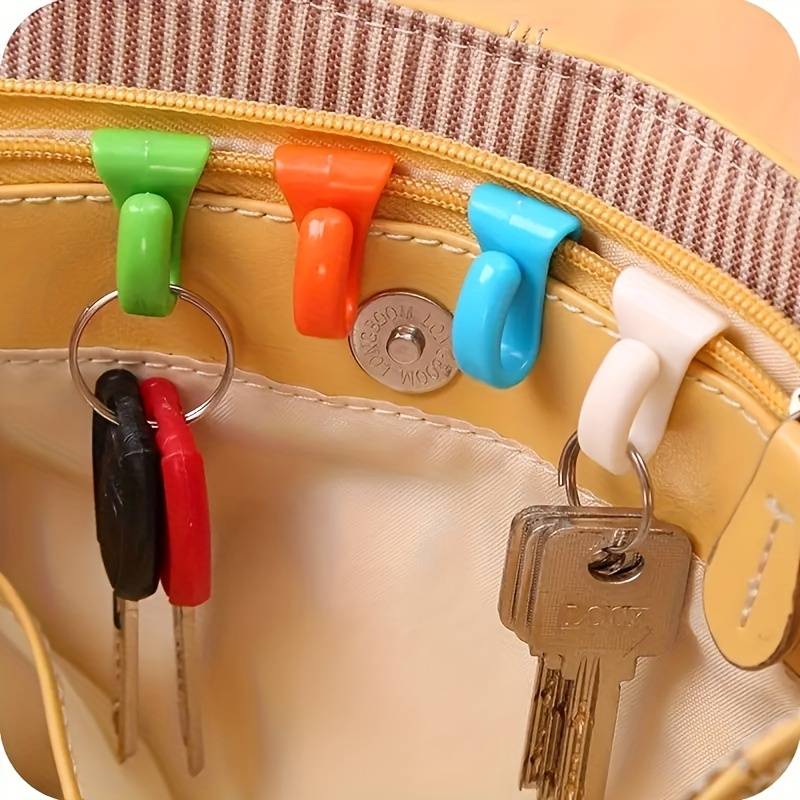 Built-in key ring for handbags