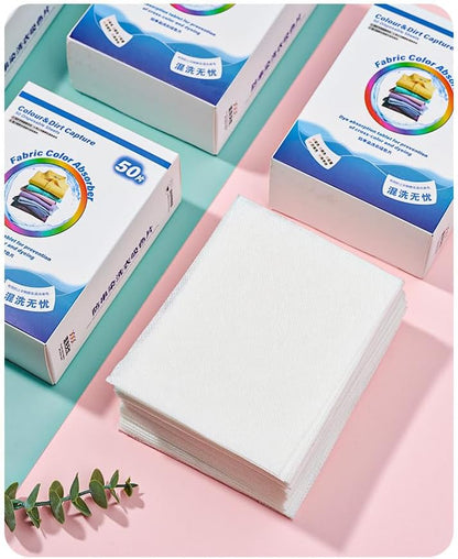 Color catcher that helps prevent colors from bleeding in the wash