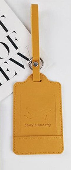 Leather luggage tag in yellow