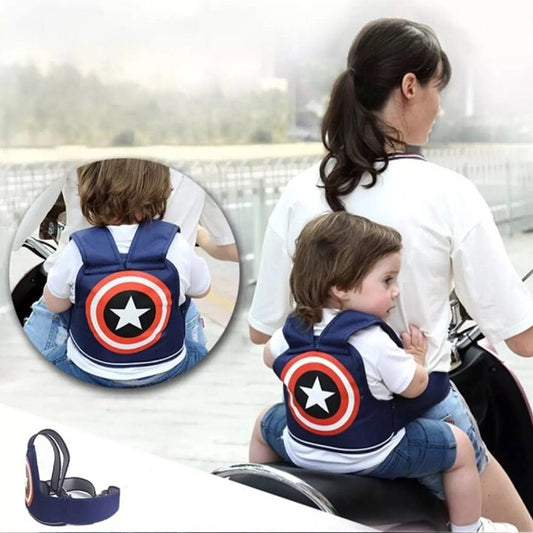 Motorcycle child safety harness that attaches to the rider