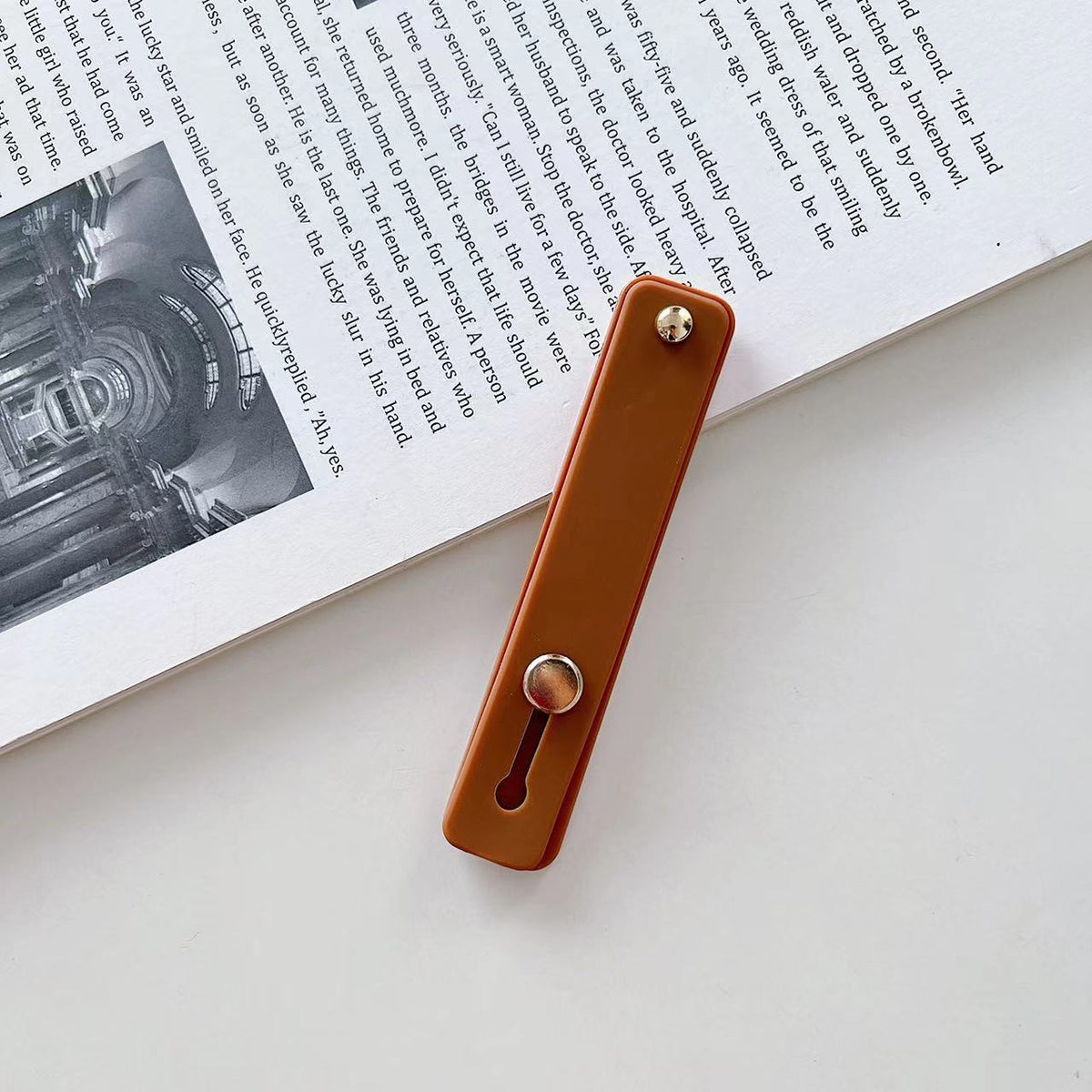 Phone grip strap holder in camel