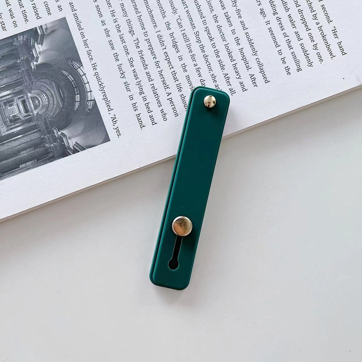 Phone grip strap holder in dark green