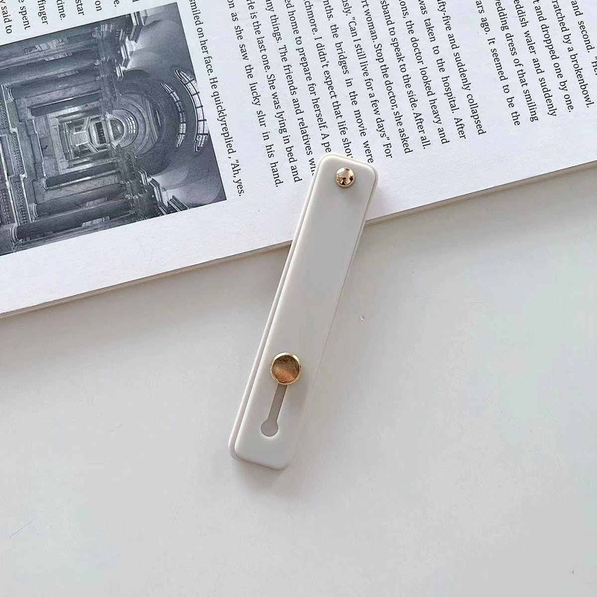 Phone grip strap holder in grey