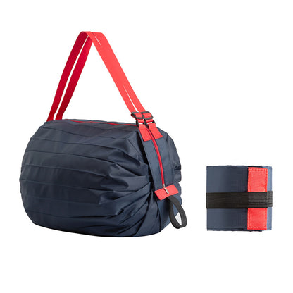 Portable large shopping bag in navy with red