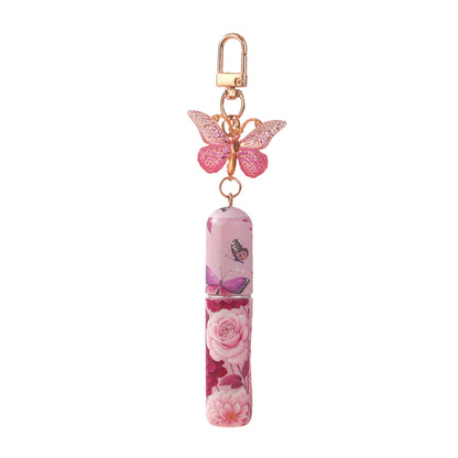 Refillable keychain perfume bottle with dark pink butterfly pendant