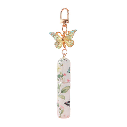 Refillable keychain perfume bottle with green butterfly pendant