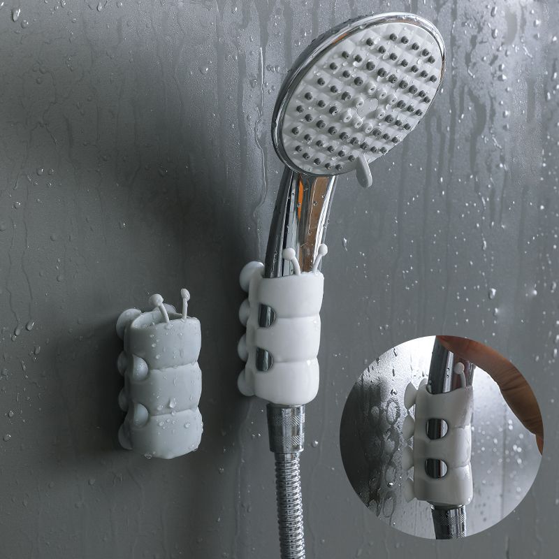 Suction cup shower head holder that installs in seconds