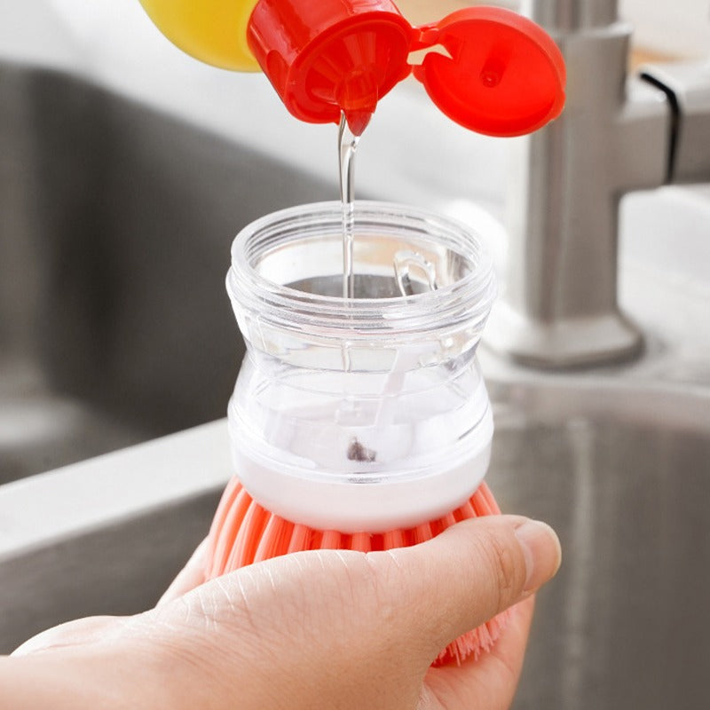 Refillable soap dispensing brush for pots, pans and hot plates