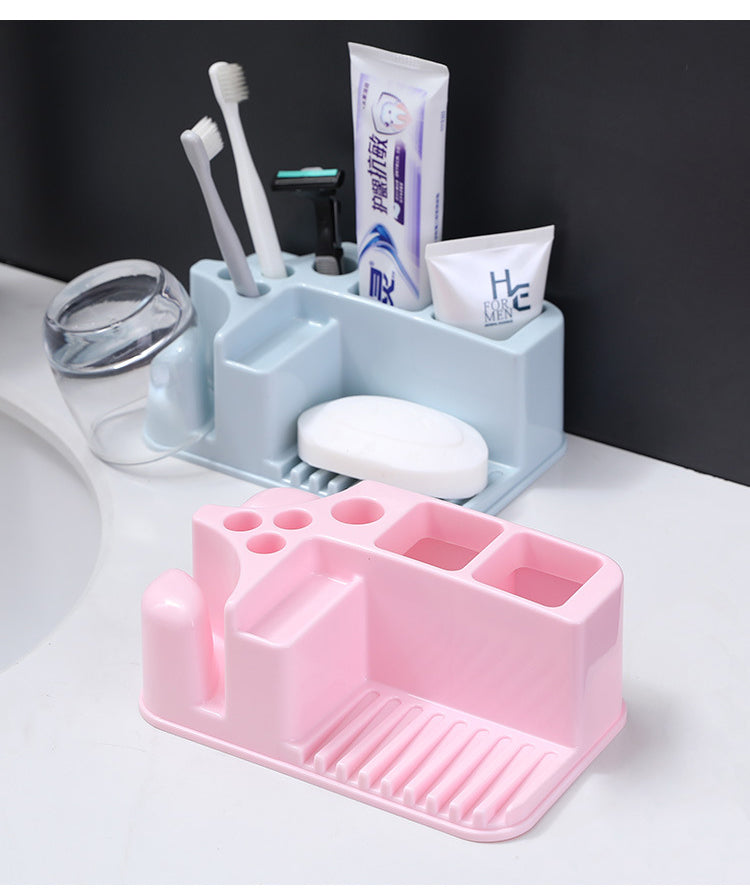 Toothbrush holder organizer for the sink