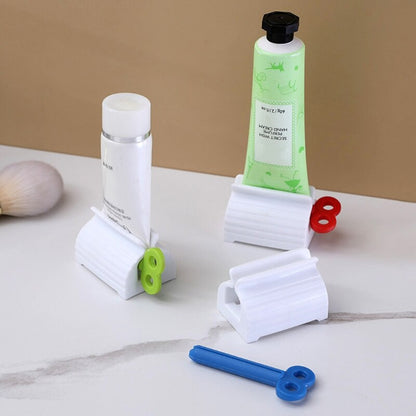 Rolling tube toothpaste squeezer that gets out every last bit