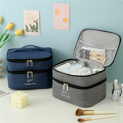 Dual layer travel cosmetic bag with a longer, wider design