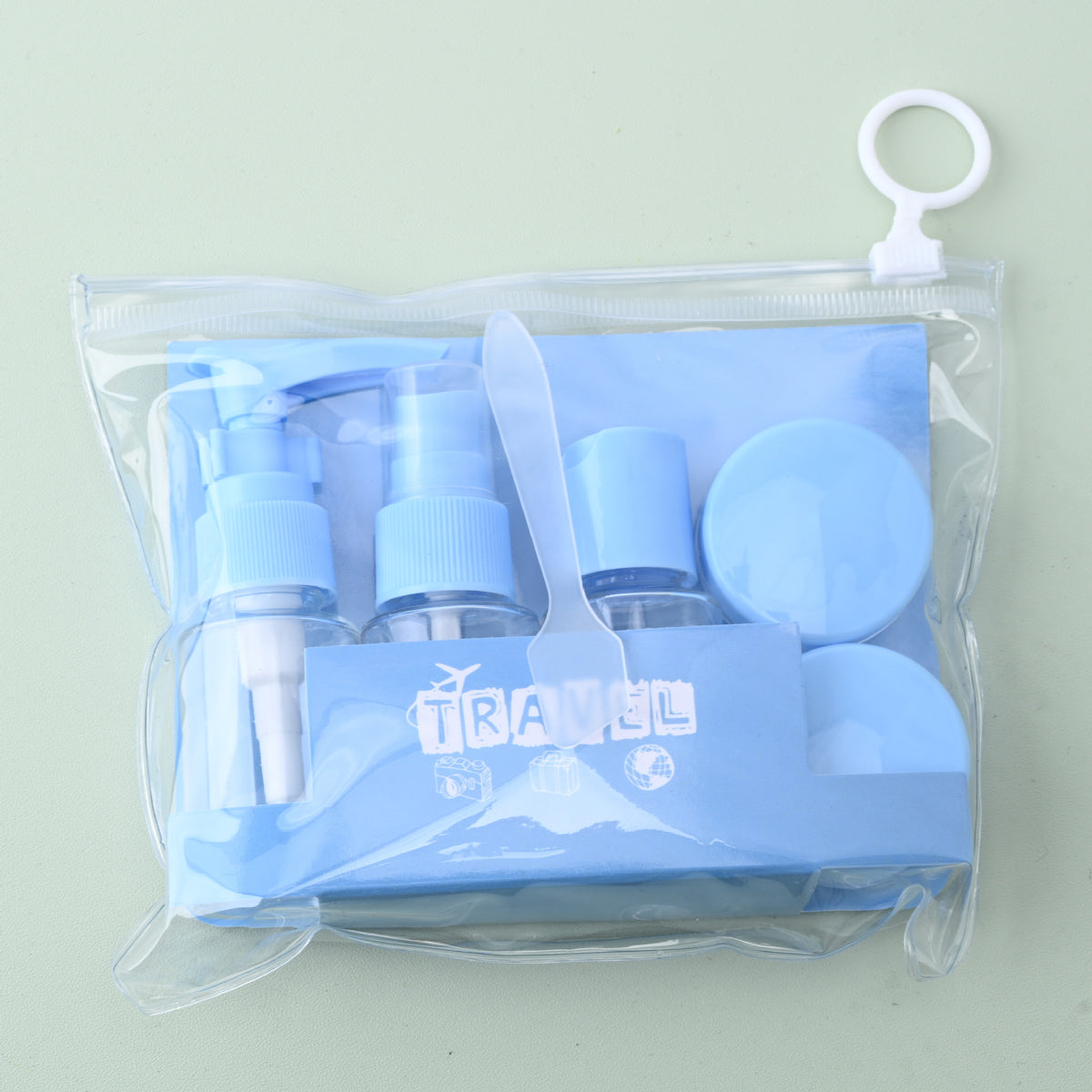 7-piece travel bottles set with pump bottle, spray bottle, small bottle, 2 jars, funnel and spoon