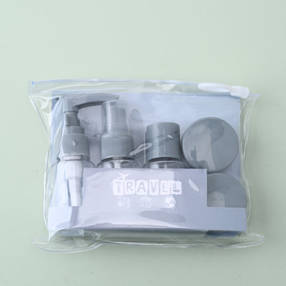 Travel refillable bottles set in gray