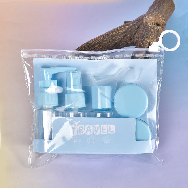 Travel refillable bottles set in light blue