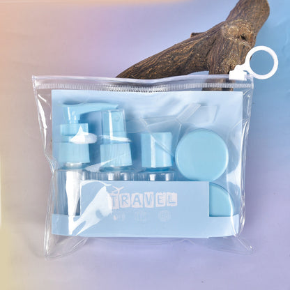 Travel refillable bottles set in light blue