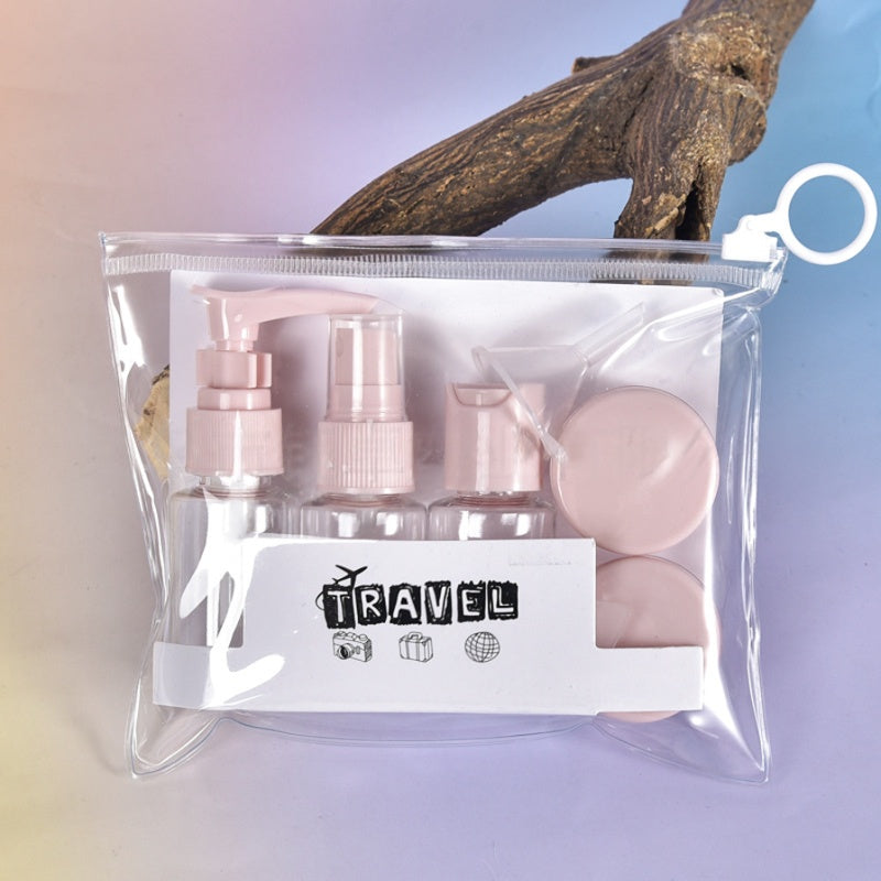 Travel refillable bottles set in light pink