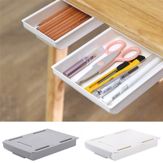 Hidden storage drawer mounted under a desk