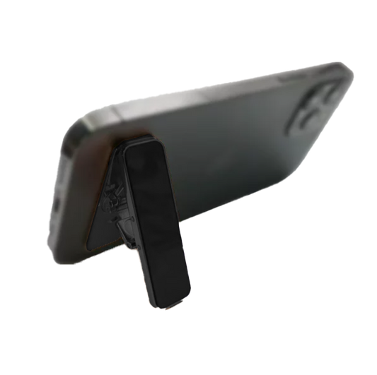 Universal 360 metal phone stand attached to the back of a phone