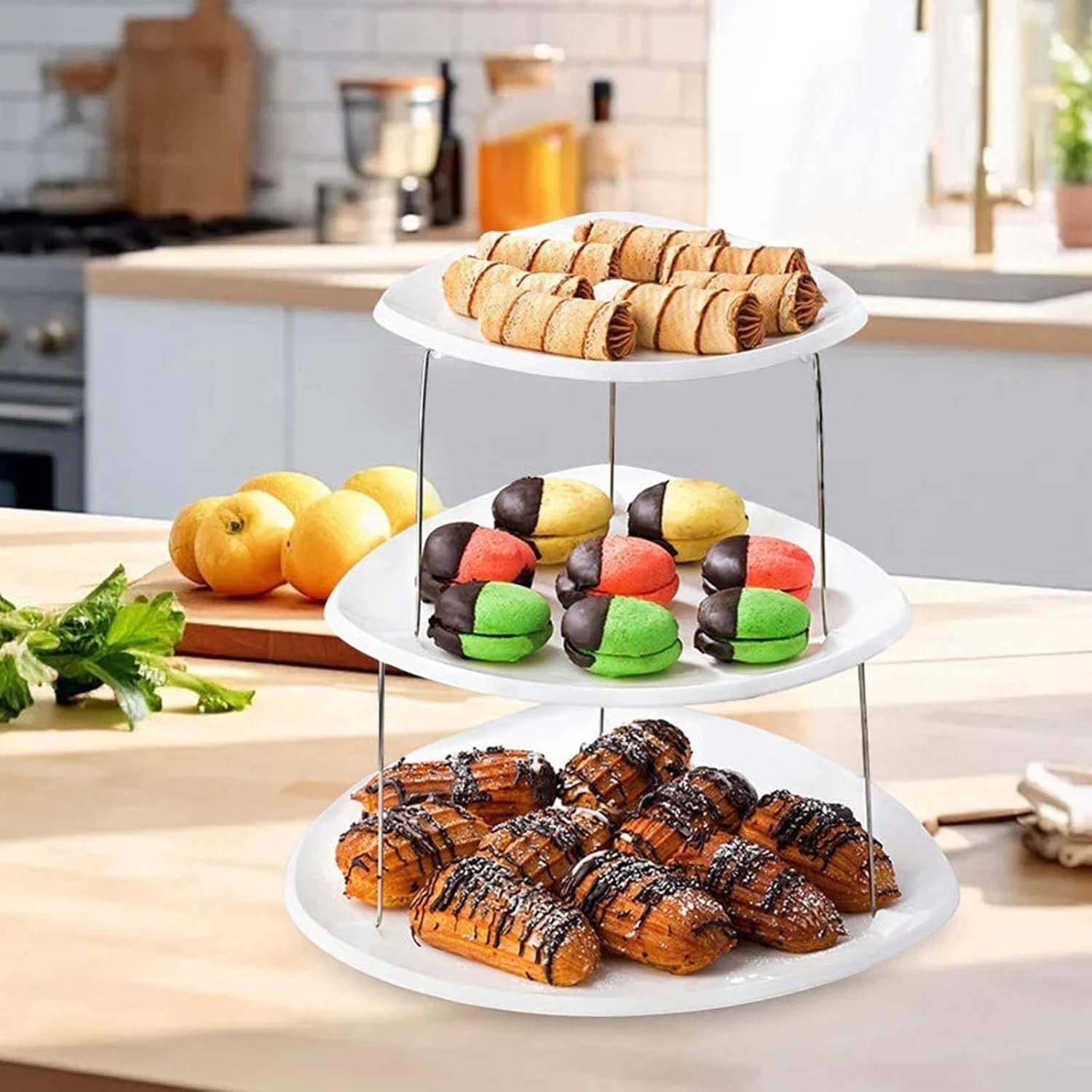 Waf Store Lebanon 3-tier white plastic foldable snack tray holding assorted pastries on a kitchen counter