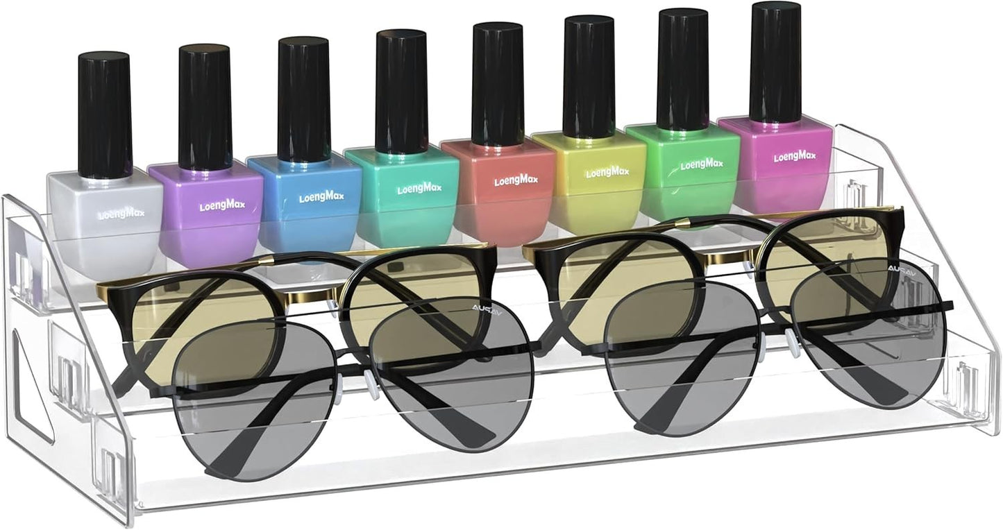Waf Store Lebanon clear acrylic 3-tier display stand holding nail polish bottles and sunglasses on a white background