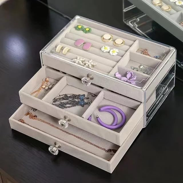 Waf Store Lebanon 3-drawer jewelry box in clear acrylic with soft grey velvet interior and crystal-style knobs.