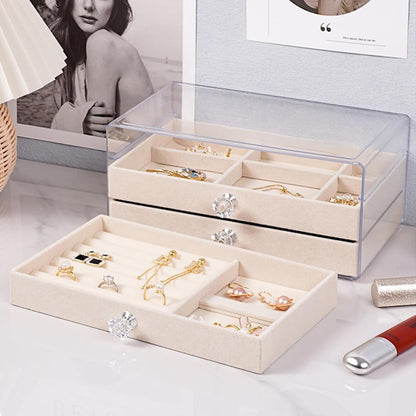 Waf Store Lebanon 3-drawer transparent acrylic jewelry box with soft beige velvet interior and crystal-style knobs.