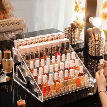 Waf Store Lebanon clear acrylic tiered nail polish display stand holding multiple bottles on a vanity table