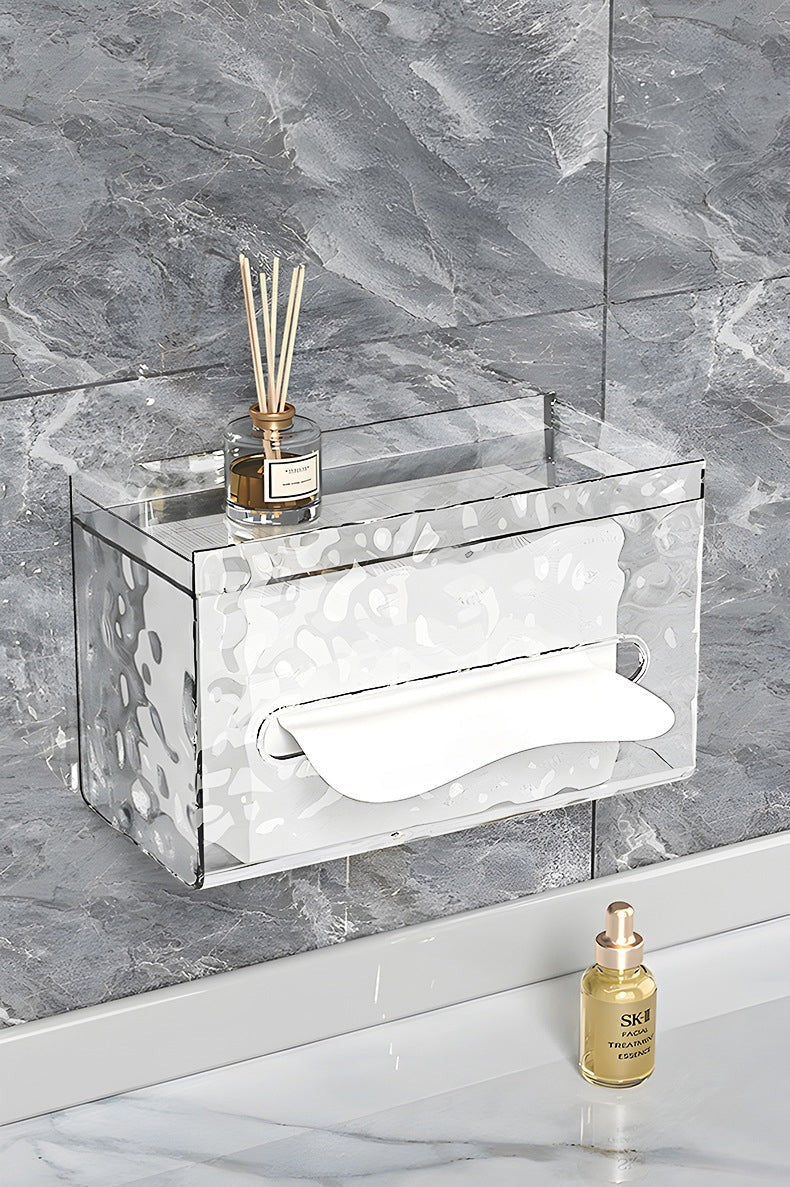 Waf Store Lebanon clear acrylic wall-mounted tissue box with a top storage shelf for bathroom essentials.