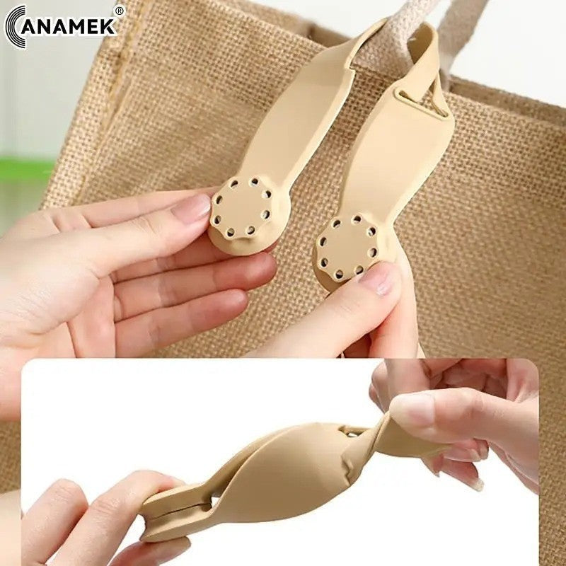 Waf Store Lebanon beige silicone hat clip attached to a tote bag, showing flexible design for travel and storage.